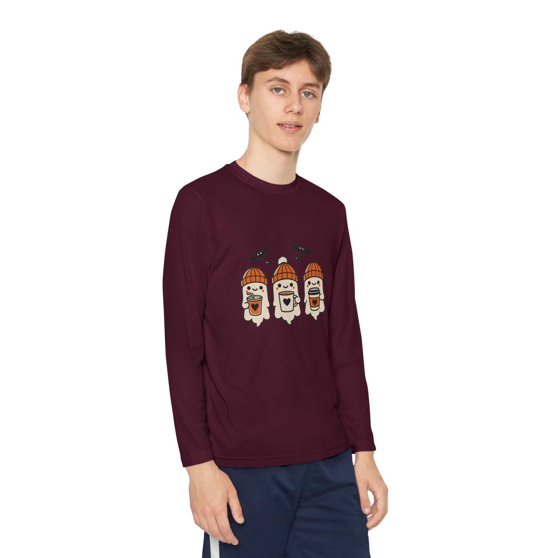 boy wearing maroon Makin’ It By Lady Ev long sleeve Halloween shirt with ghost and bat design.