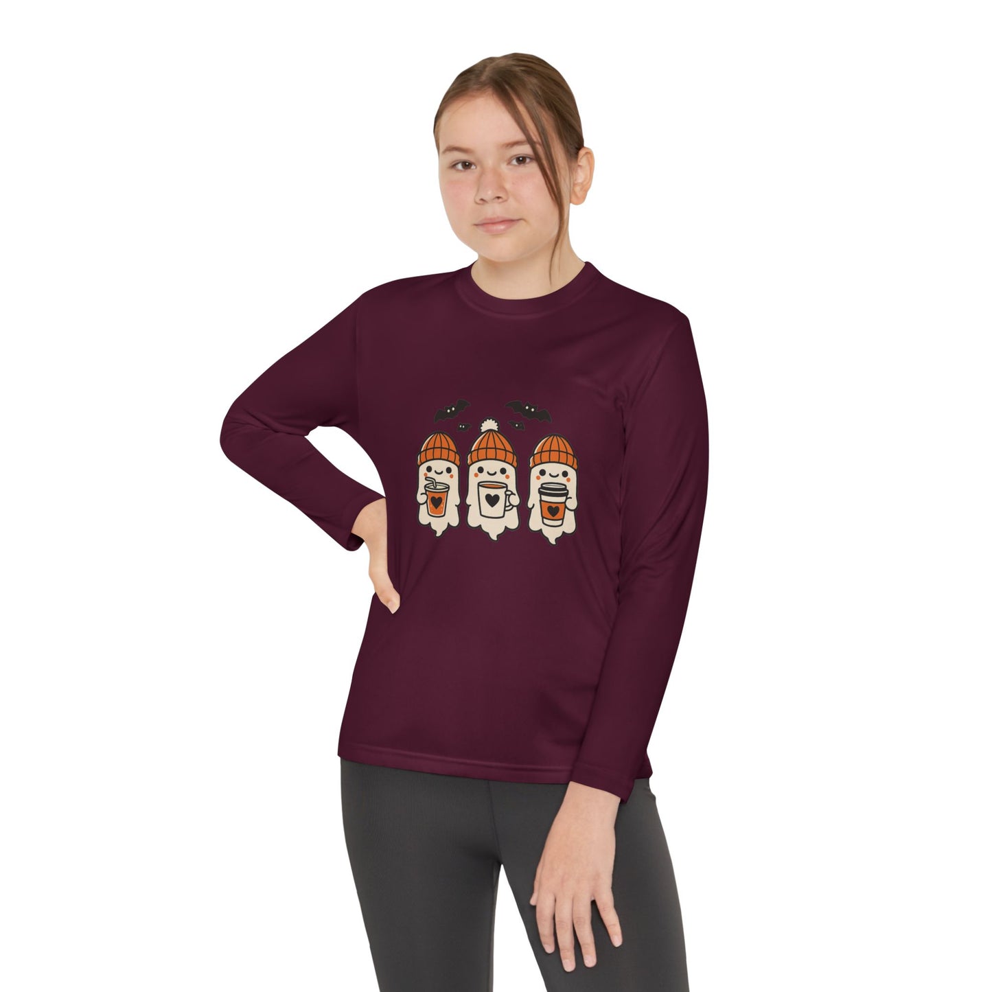 girl modeling maroon Makin’ It By Lady Ev long sleeve Halloween shirt with three cute ghosts.