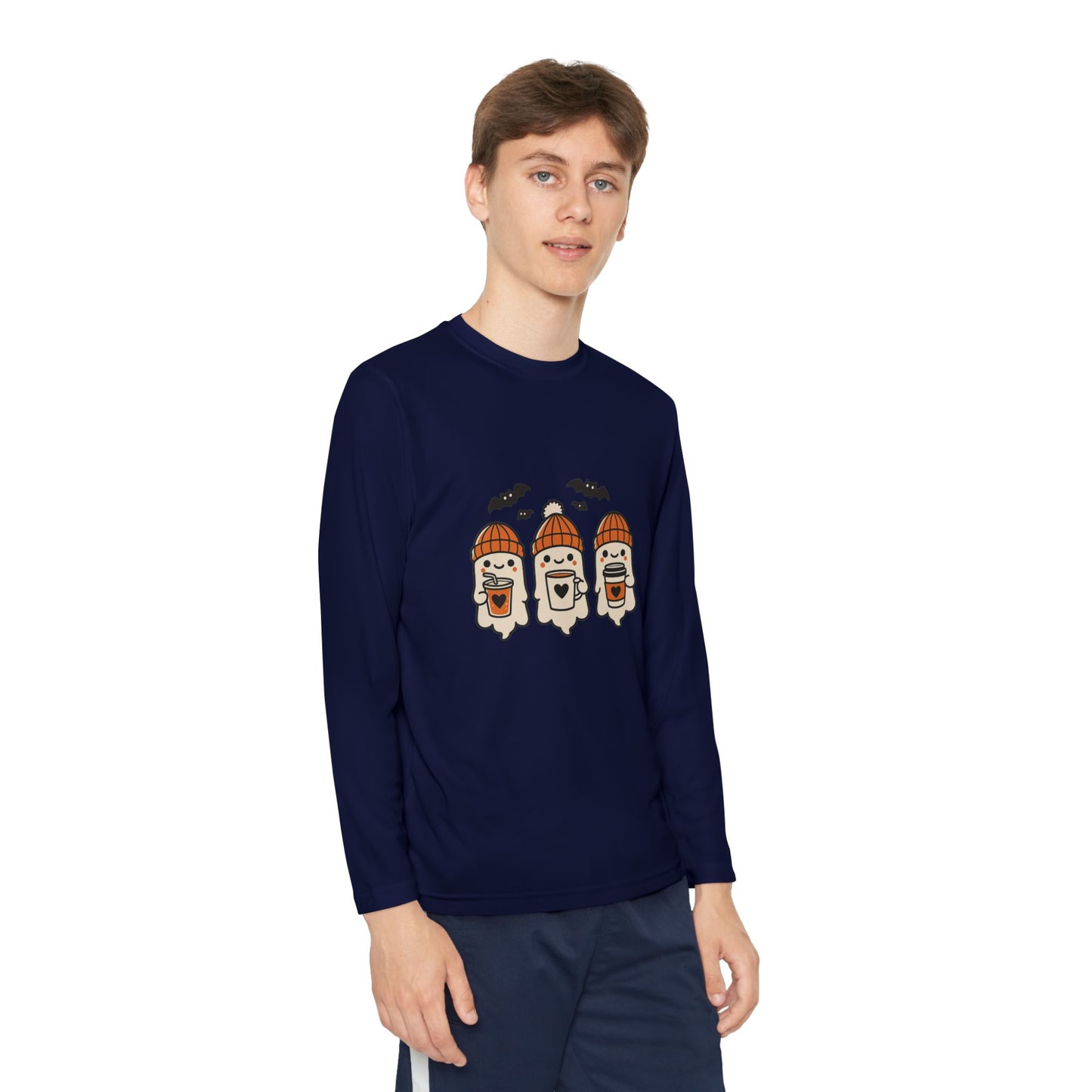 Young Male model wearing a navy blue long sleeve Halloween shirt with three adorable ghosts in orange beanies holding coffee cups and bats above, by Makin’ It By Lady Ev.