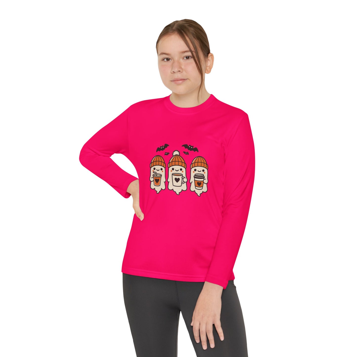 Girl modeling Makin’ It By Lady Ev pink long sleeve Halloween shirt with three ghosts in beanies.