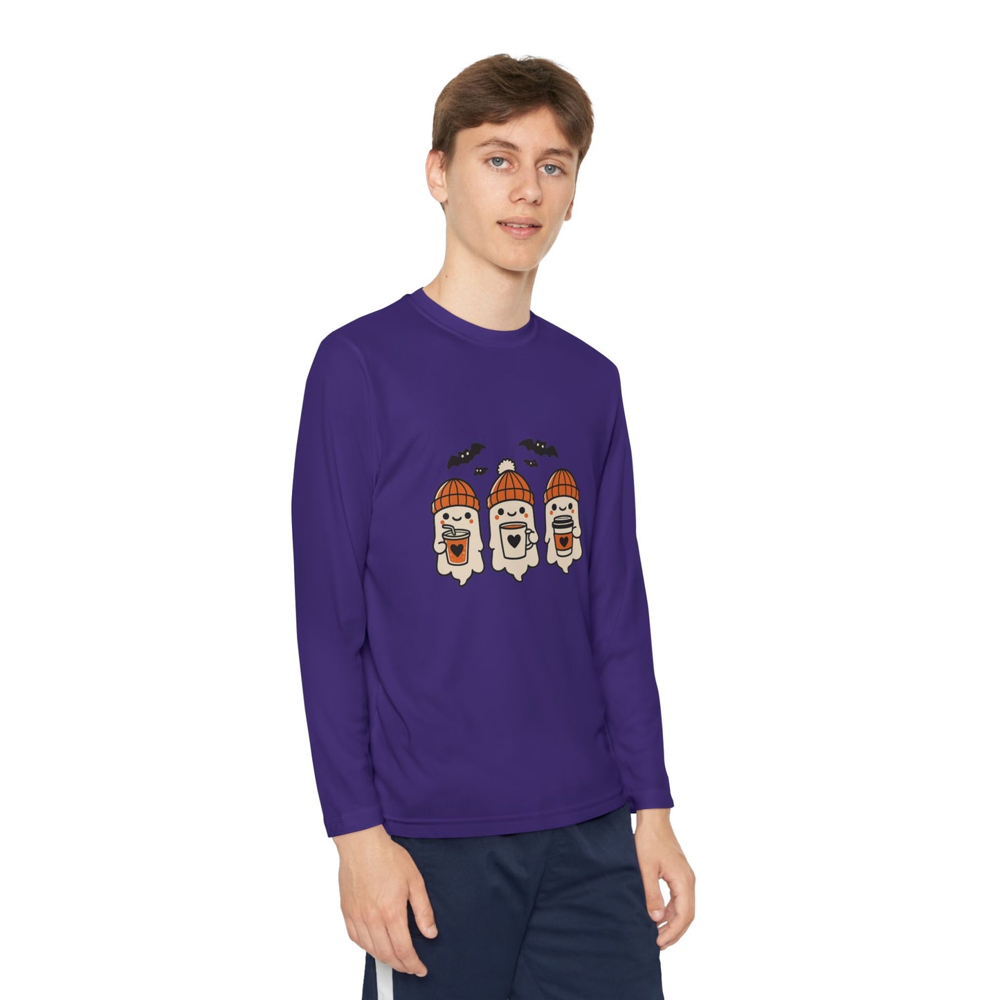 Young Male model wearing purple long sleeve Halloween shirt with three cozy ghosts in orange beanies holding coffee cups and bats above, by Makin’ It By Lady Ev.