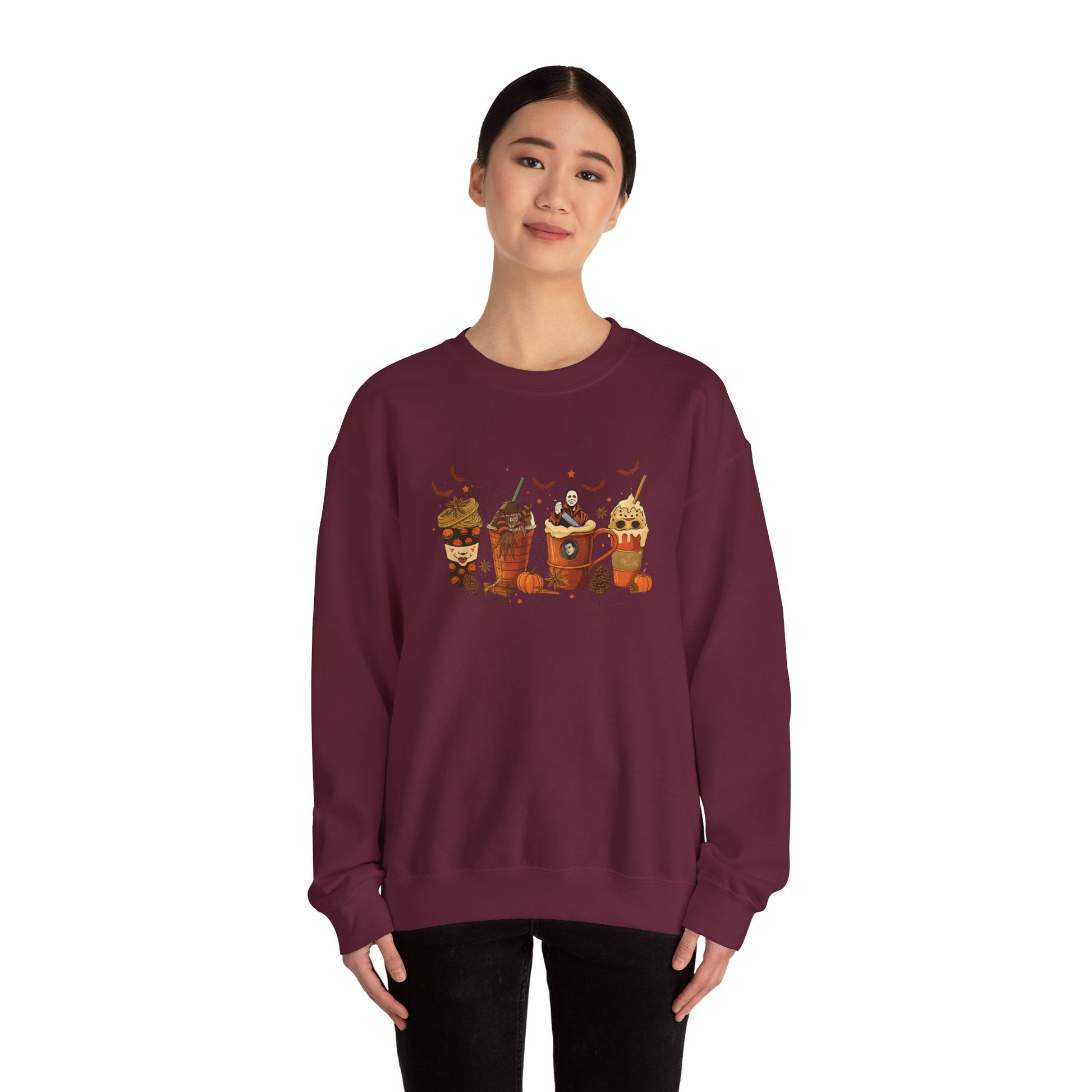 Maroon Gildan 18000 unisex crewneck sweatshirt with Halloween horror coffee drinks design, shown on model for casual fit and style.