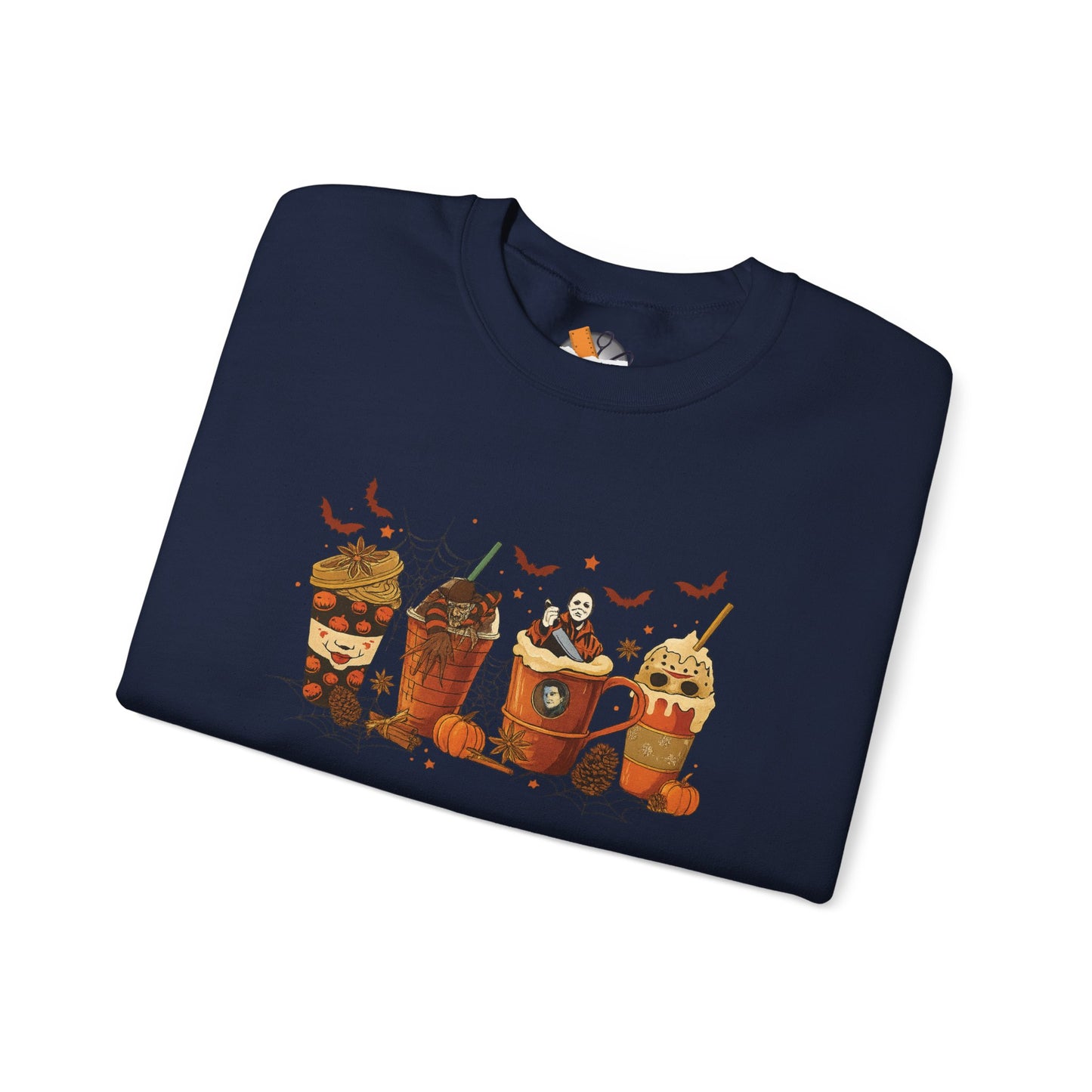 Folded navy Gildan 18000 crewneck sweatshirt with Halloween horror coffee drinks graphic featuring spooky characters, pumpkins, and bats.