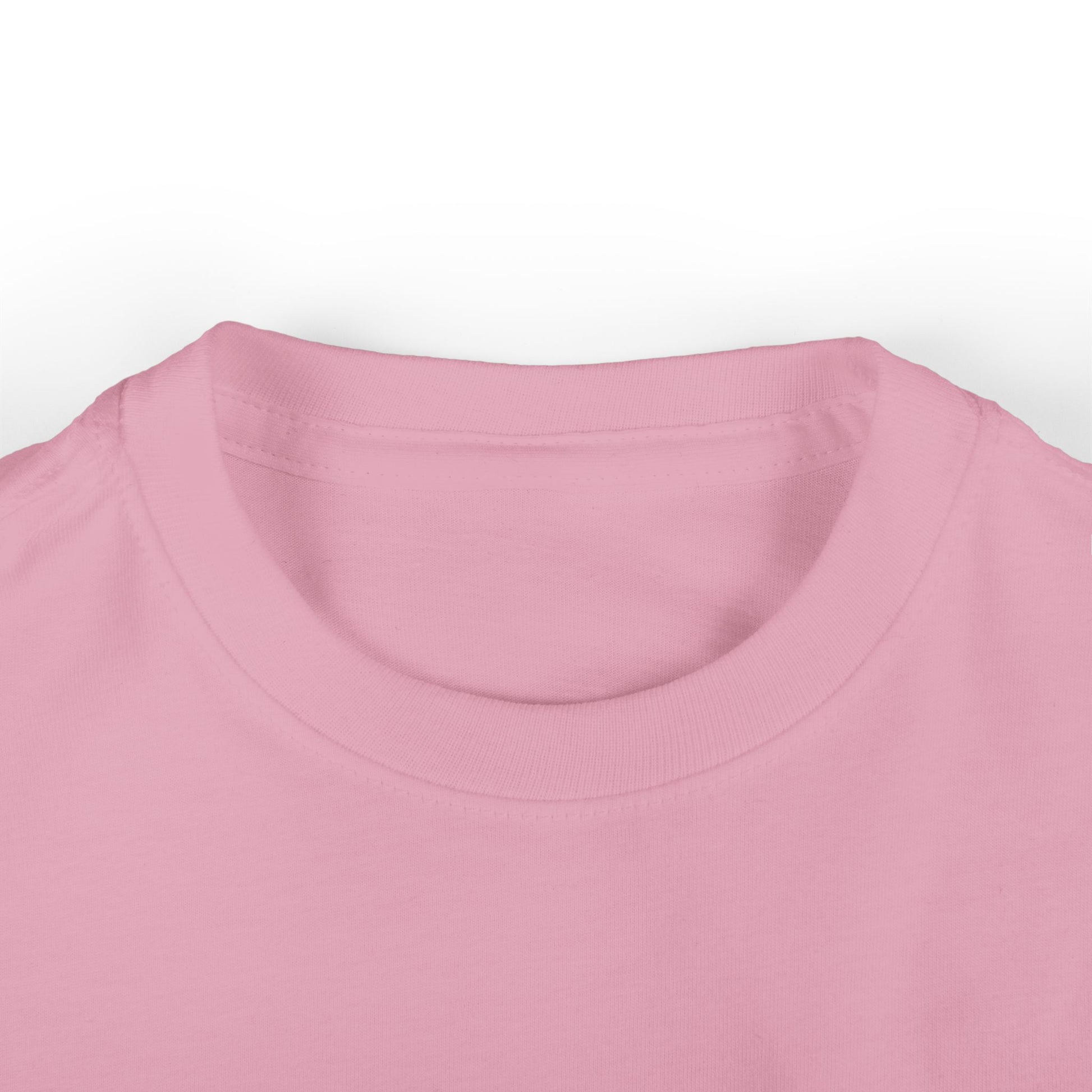 Close up of toddler girls’ light pink cotton t-shirt collar, soft crewneck design for everyday wear
